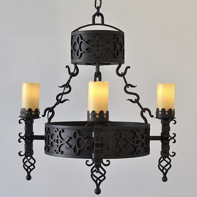 Large resin candle on iron chandelier