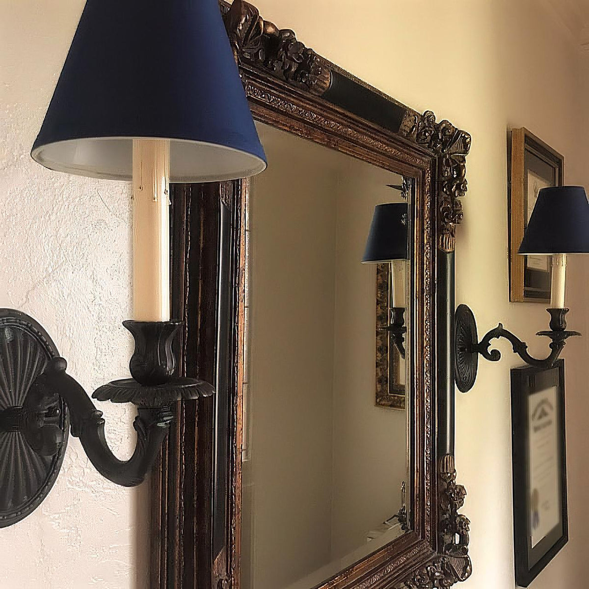 Cardboard candle cover on wall sconce