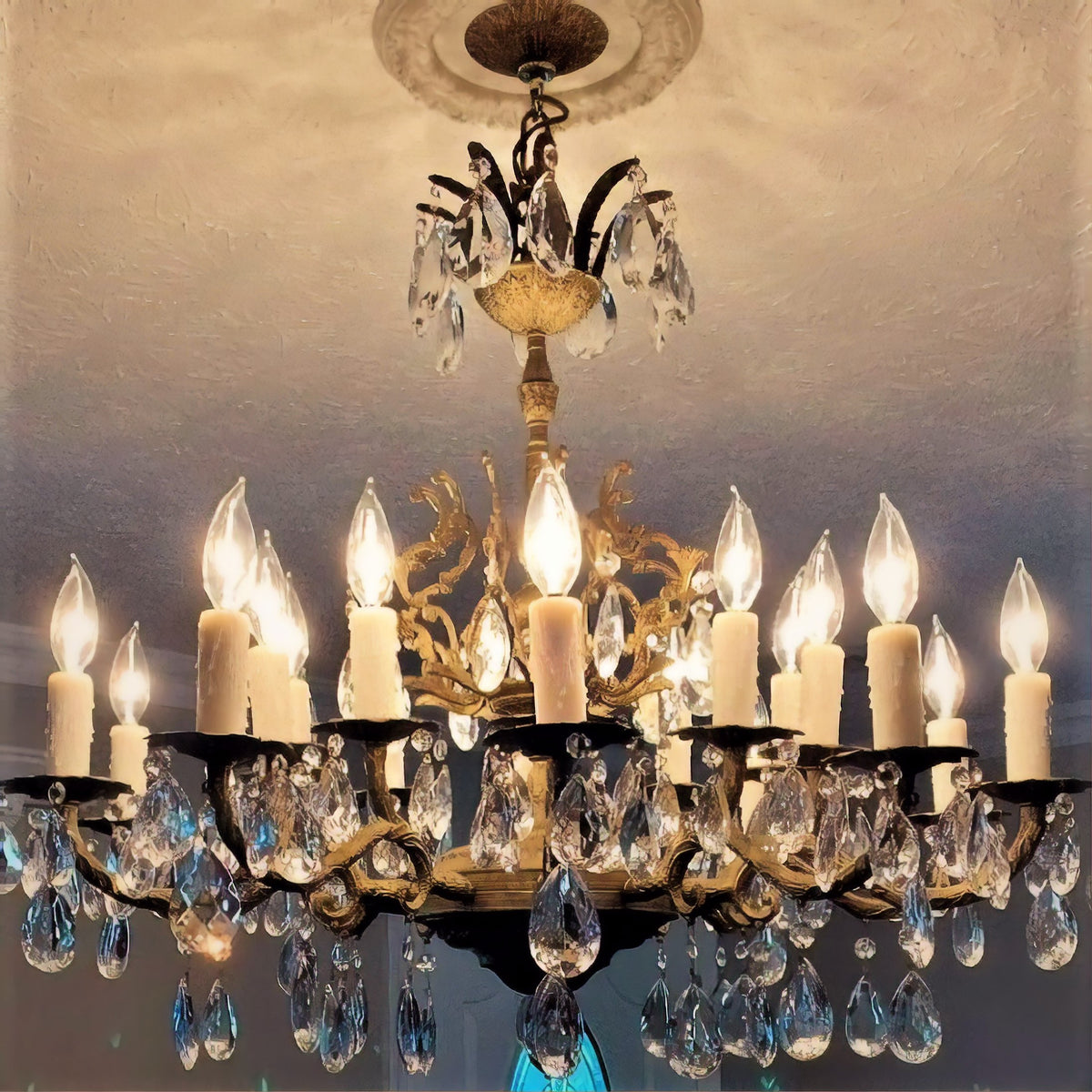 Candle sleeves installed on chandelier